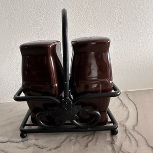 Lindenberger, brown salt and pepper shaker with iron holder